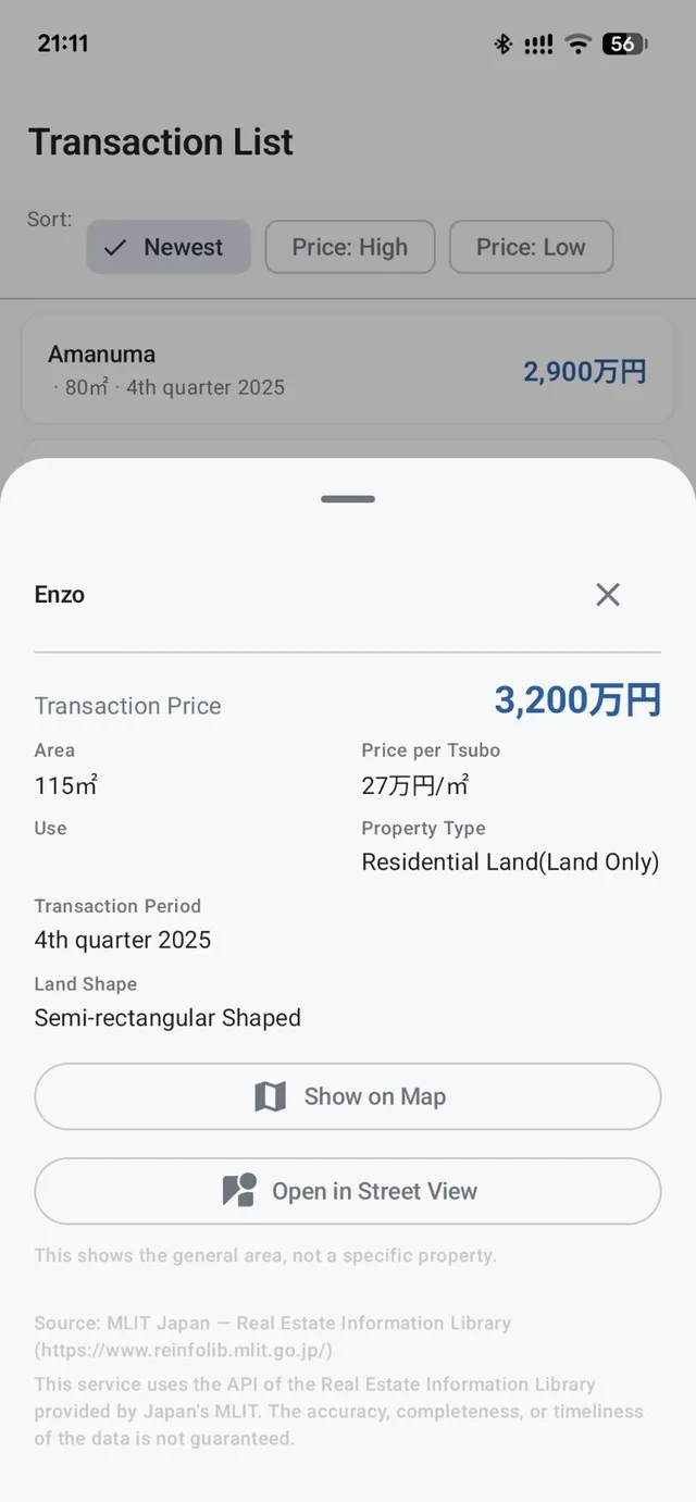 Transaction detail screen showing price, area, price per tsubo, use, property type, transaction period, and land shape for a land-only sale